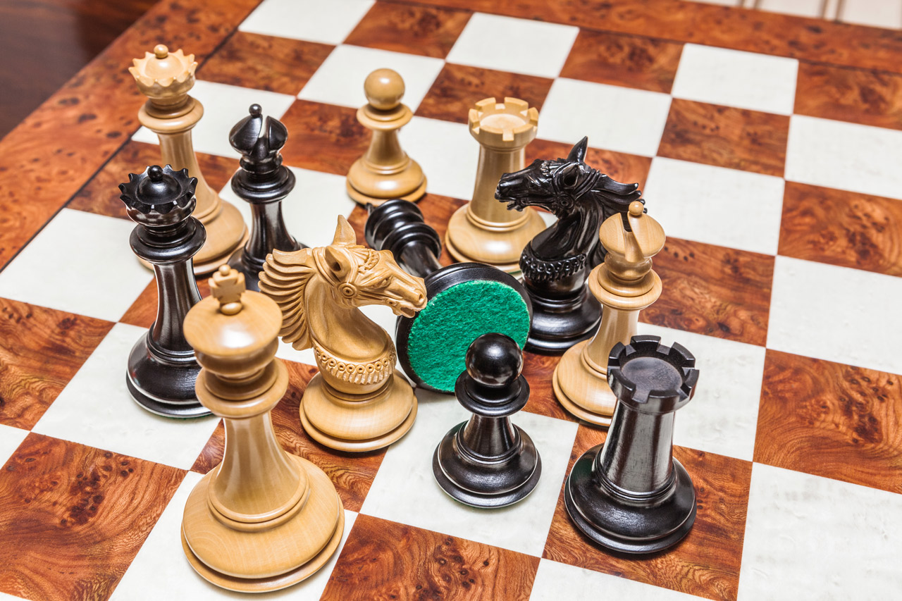 The Apollo chess pieces (Ebony and Boxwood) on the 60 cm Toscana board The Apollo Series Chess Pieces in Ebony and Boxwood