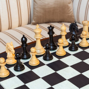 Florence ebony and boxwood pieces arranged for play on the Asturias board