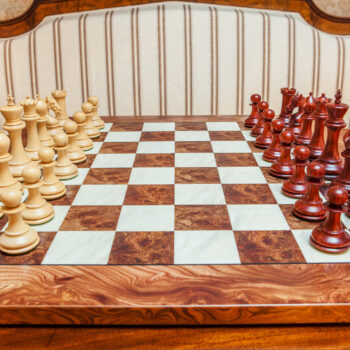 Chevalier padauk and boxwood chess pieces in the starting position