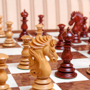 Shown with: 60 cm Segovia chess board Dali lacquered padauk and boxwood chess pieces during play on the 60 cm Segovia chess board