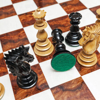 Shown with: 60 cm Da Vinci chess board Overhead close-up of Dali lacquered ebony and boxwood chess pieces on the 60 cm Da Vinci chess board