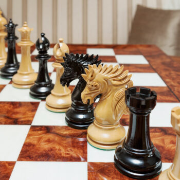 Shown with: 60 cm Da Vinci chess board Duke lacquered ebony and boxwood chess pieces during play on the 60 cm Da Vinci chess board