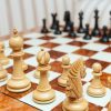The Duke chess pieces (Lacquered Ebony and Boxwood) on the 60 cm Da Vinci board Duke 4.4 inch chess pieces in Lacquered Ebony and Boxwood