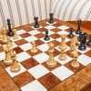 The Duke chess pieces (Lacquered Ebony and Boxwood) on the 60 cm Da Vinci board Duke 4.4 inch chess pieces in Lacquered Ebony and Boxwood