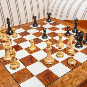 Shown with: 60 cm Da Vinci chess board High-angle view of Duke lacquered ebony and boxwood chess pieces on the 60 cm Da Vinci chess board