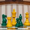 Earl Yellow and Green on the 50 cm Cordoba board Earl Yellow and Green Chess Pieces on the red 50 cm ”Cordoba” Chess Board