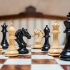 The Florence chess pieces (Ebony and Boxwood) on the 60 cm Toscana board The Florence Series Luxury Chess Pieces in Ebony and Boxwood