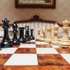 The Florence chess pieces (Ebony and Boxwood) on the 60 cm Toscana board The Florence Series Luxury Chess Pieces in Ebony and Boxwood