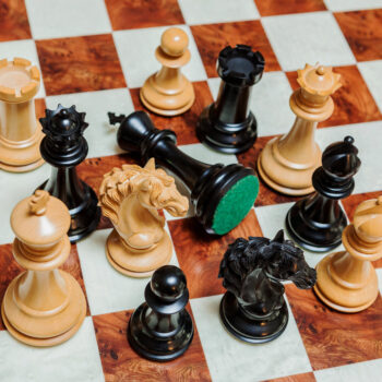 Shown with: 60 cm Toscana chess board Overhead close-up of Florence ebony and boxwood chess pieces on the 60 cm Toscana chess board