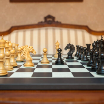 Shown with: 60 cm Asturias chess board Wide view of Florence ebony and boxwood chess pieces on the 60 cm Asturias chess board