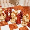 The Florence chess pieces (Padauk and Boxwood) on the 60 cm Toscana board The Florence Series Luxury Chess Pieces in Padauk and Boxwood