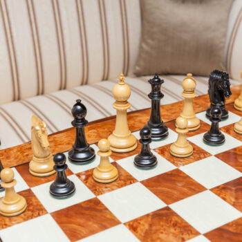 Duke ebony and boxwood pieces in a game position on the Da Vinci board