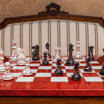 New York black-and-white pieces in a game position on the Bologna board