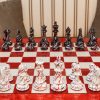 New York Series Chess Pieces on the red 51 cm ”Bologna” Chess Board