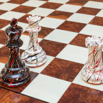 Shown with: 51 cm Pisa chess board Close-up of New York black-and-white splatter chess pieces on the 51 cm Pisa chess board