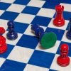 Earl Navy Blue and Red chessmen on the 51 cm Capri board Navy Blue and Red Earl chessmen on a blue board