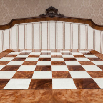 Da Vinci 60 cm high-gloss root of elm chess board in an interior setting