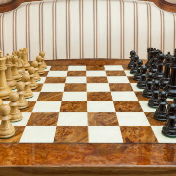 Viking ebony and boxwood pieces in their starting positions on the Venezia board