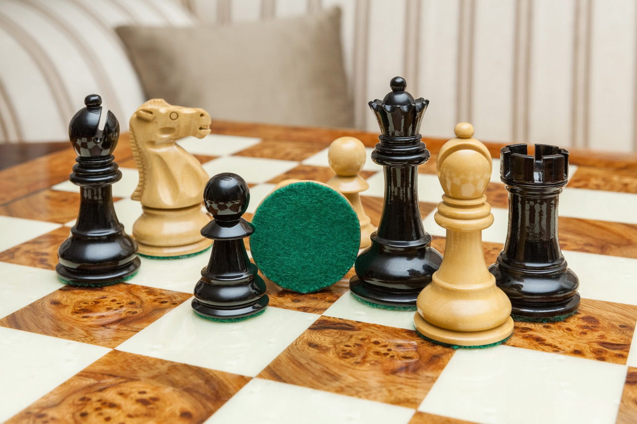 Saga chess set with a root of elm board
