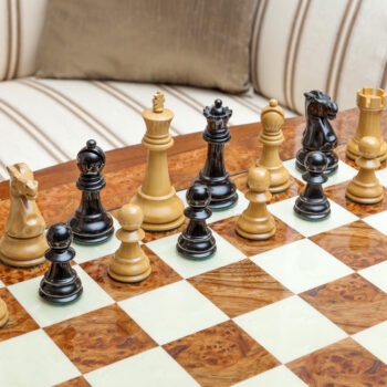 Viking ebony and boxwood pieces in a game position on the Venezia board