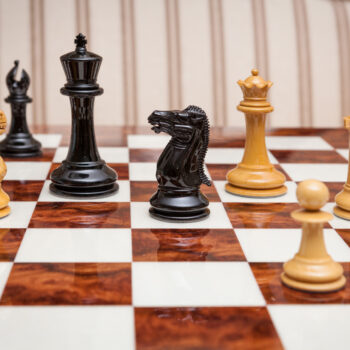 Shown with: 60 cm Da Vinci chess board Staunton Evolution lacquered ebony and boxwood chess pieces viewed at board level on the 60 cm Da Vinci chess board
