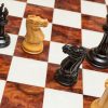 Staunton Evolution 4.25 inch chess pieces in Lacquered Ebony and Boxwood