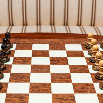 Vulcan burnt boxwood pieces in their starting positions on the 50 cm Cordoba board