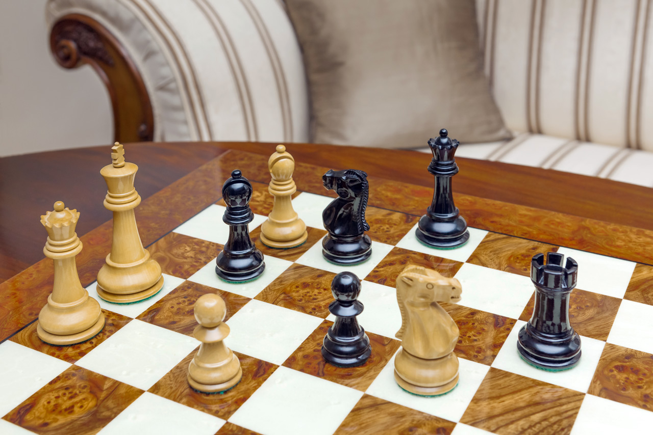 The Viking chessmen (boxwood and ebony) on the Venezia Board