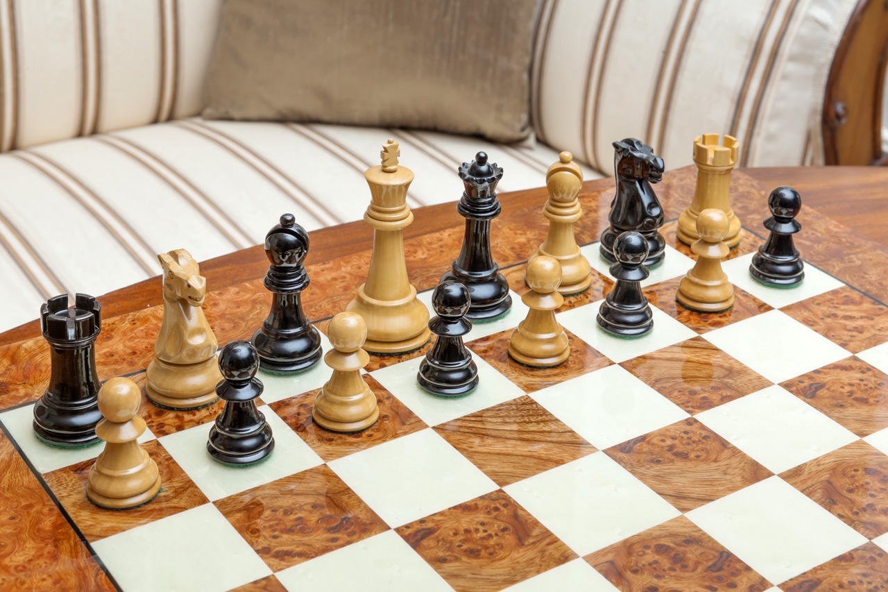 The Viking chessmen (boxwood and ebony) on the Venezia Board