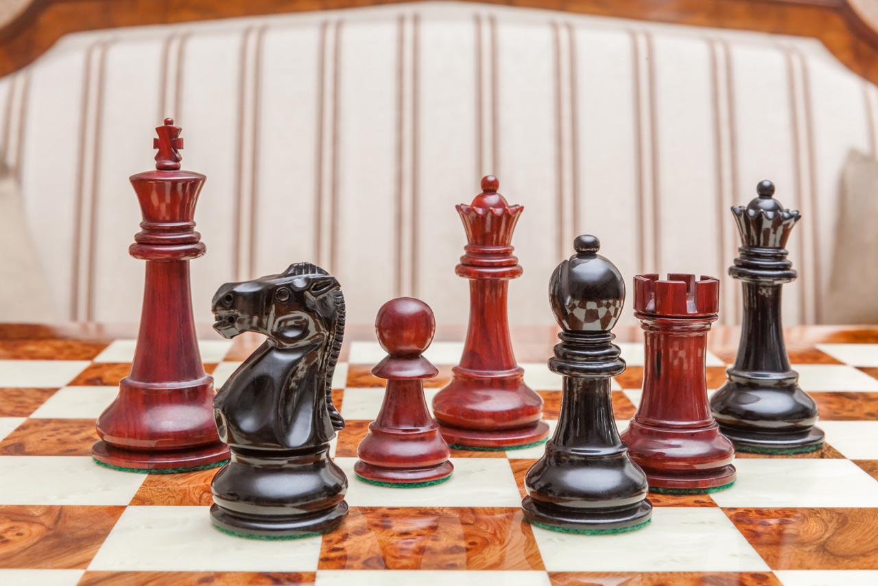 The Viking chessmen (ebony and padauk) on the Venezia Board