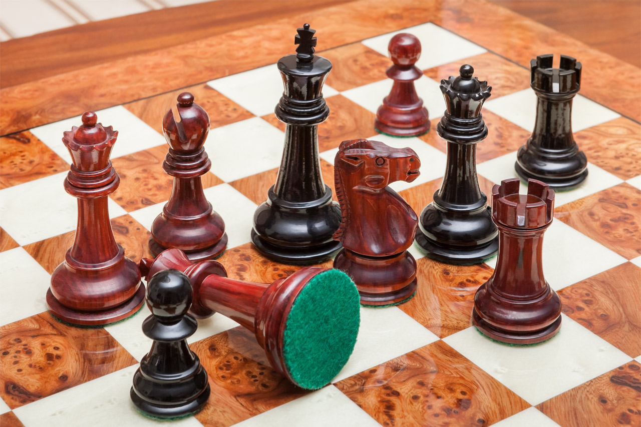 The Viking chessmen (ebony and padauk) on the Venezia Board