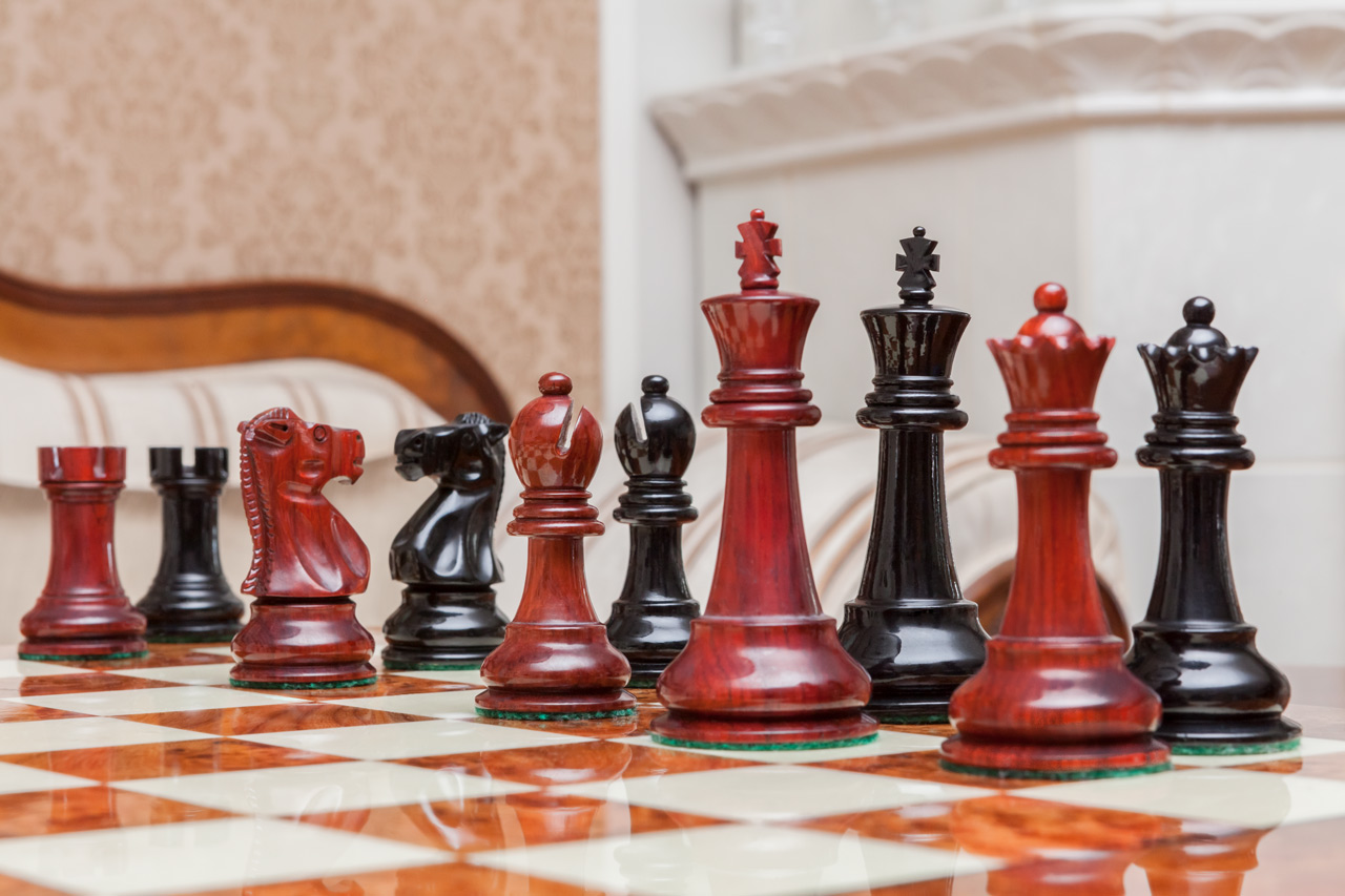 The Viking chessmen (ebony and padauk) on the Venezia Board