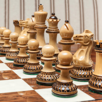 Shown with: 50 cm Cordoba chess board Vulcan burnt boxwood and natural boxwood chess pieces viewed from the light side on the 50 cm Cordoba chess board