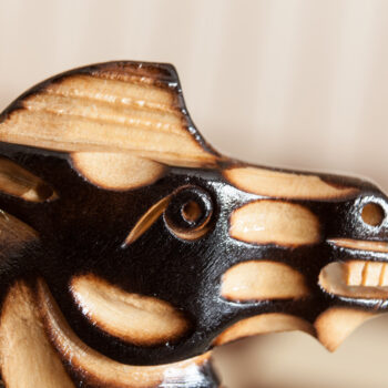 Close-up of a burnt boxwood Vulcan knight from the Vesuvius set